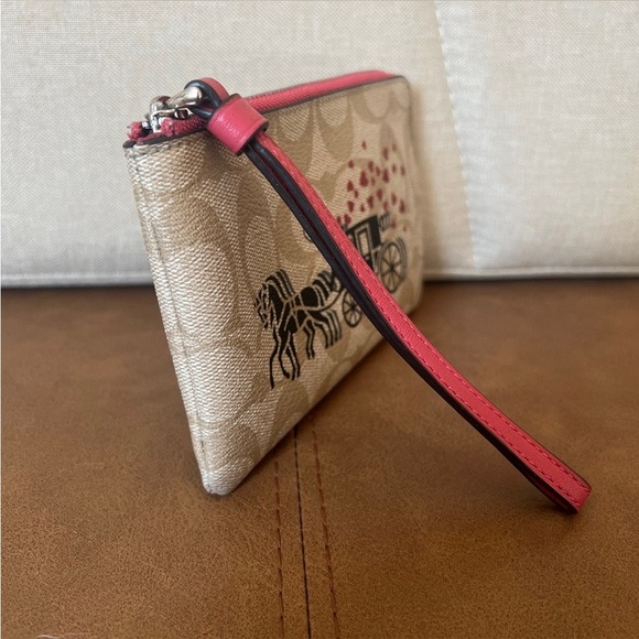 COACH Corner Zip Wristlet In Signature Canvas With Horse & Carriage Hearts Motif - Picture 7 of 15